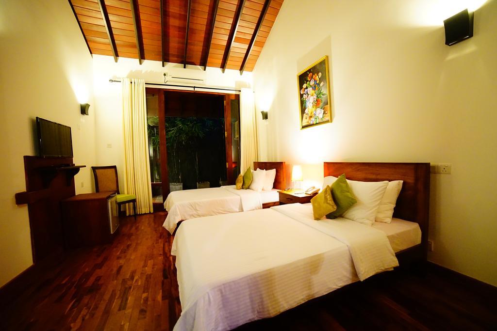 Lespri Grand Hotell Negombo Rum bild